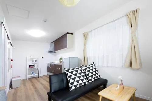 Отель Ookini House Osaka Dome Гостевой дом