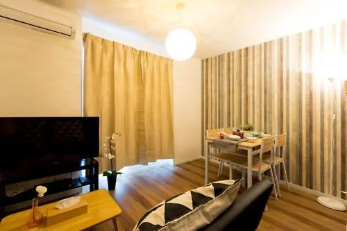 Отель Ookini House Osaka Dome Гостевой дом